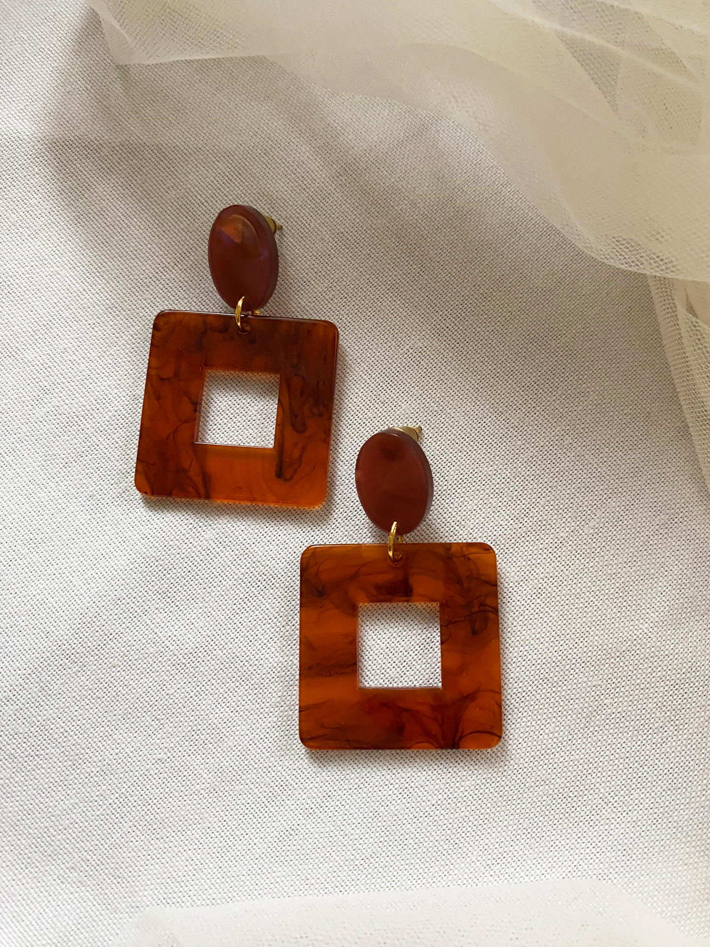 OHRRING BRAUN LEICHT TRANSPARENT